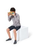 Toy-Con VR Goggles held to the face, as shown in Nintendo’s 2019 VR Kit announcement.