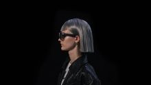 Side view of a model wearing XREAL Air 2 Ultra.