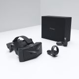 Pimax Crystal Light with its packaging and controllers.