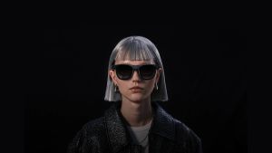XREAL Air 2 Ultra worn by a model.