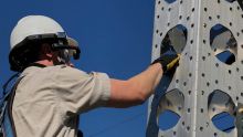 HMT-1 worn with a hard hat.