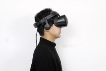 Samsung HMD Odyssey worn by a user.